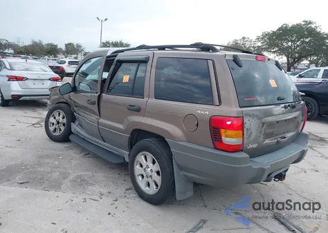 2001 Jeep Grand Cherokee Laredo z USA, uszkodzony, nr VIN 1J4GW48NX1C554595
